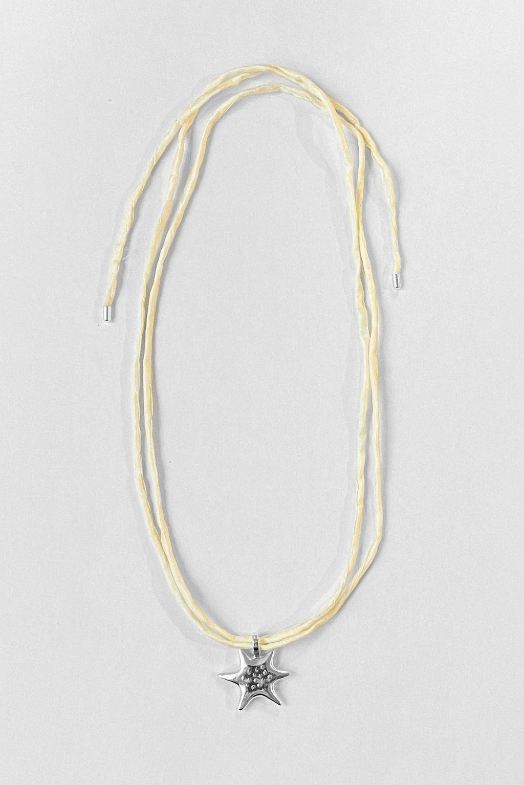 Sea Star on Raw Silk | Sterling Silver + Cream Silk